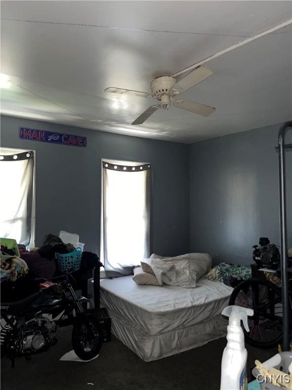 bedroom featuring ceiling fan