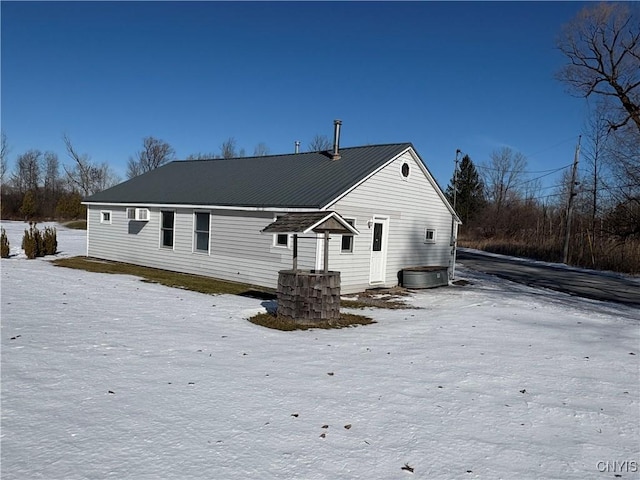 view of snow covered house