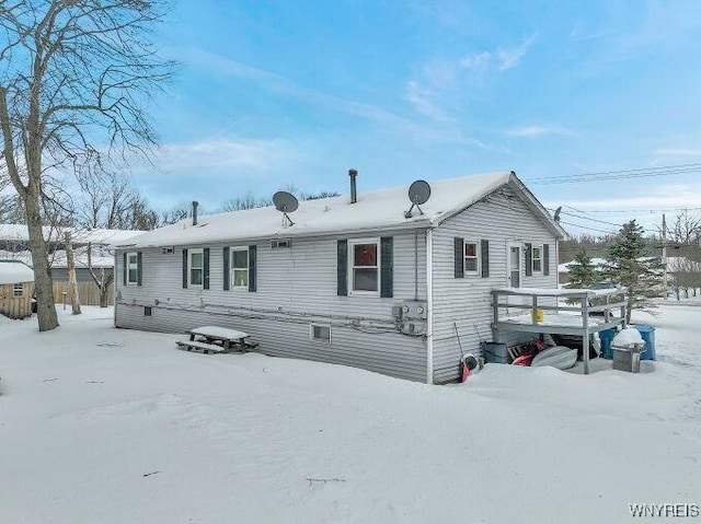 view of snow covered property