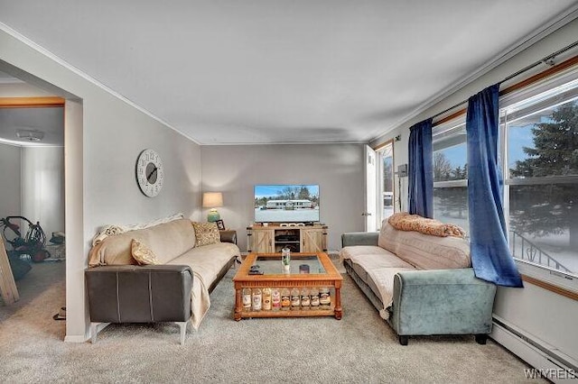 living room with a baseboard heating unit, carpet floors, and ornamental molding