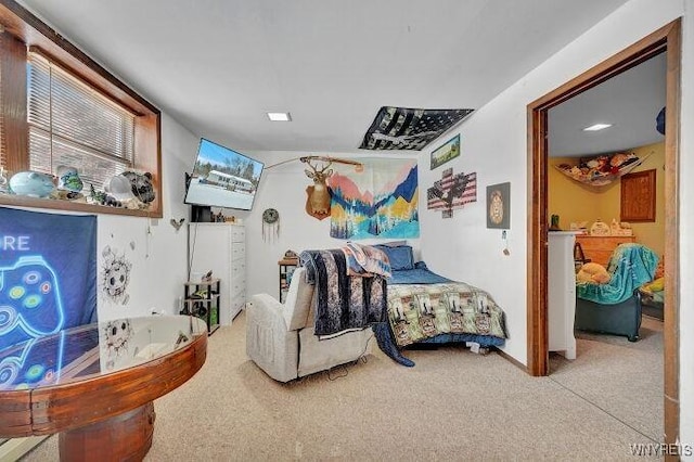 bedroom with light colored carpet