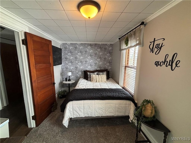 bedroom featuring crown molding