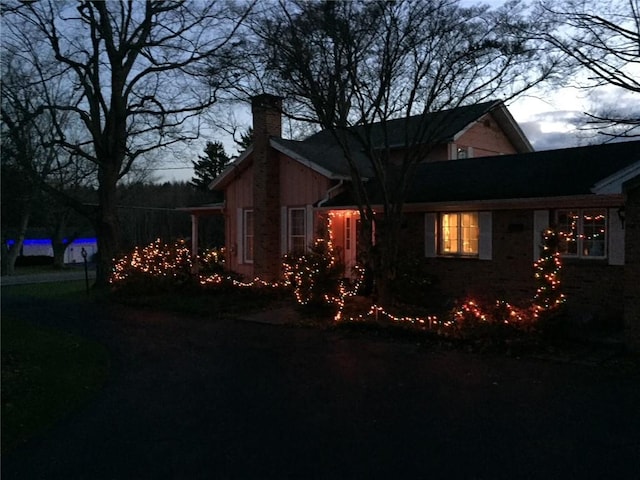 view of property exterior at dusk