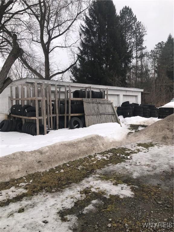 exterior space featuring a detached garage