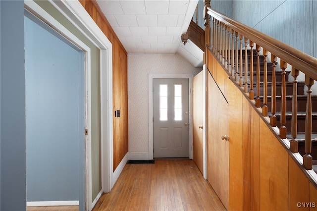 doorway with light hardwood / wood-style flooring