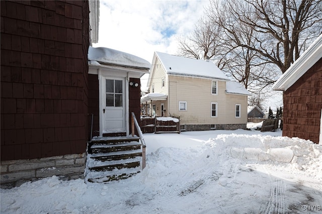 view of snow covered house