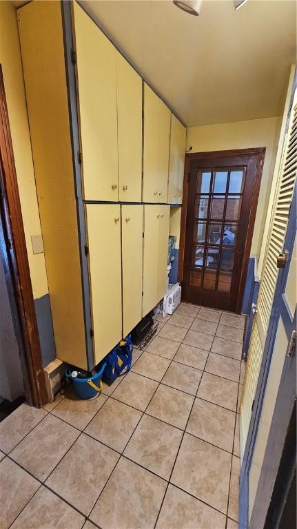 interior space featuring light tile patterned flooring