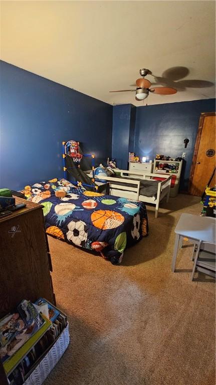 bedroom with carpet floors and ceiling fan