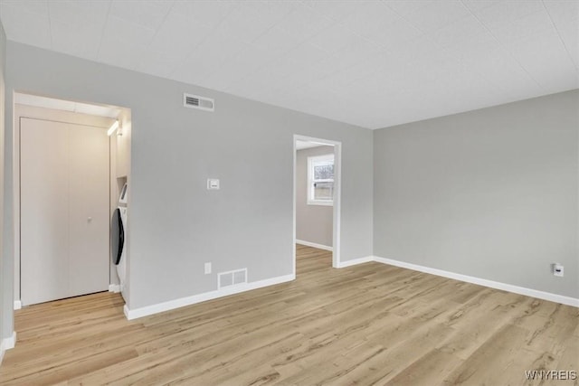 empty room featuring light hardwood / wood-style floors