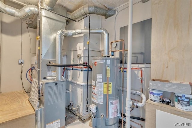 utility room with water heater