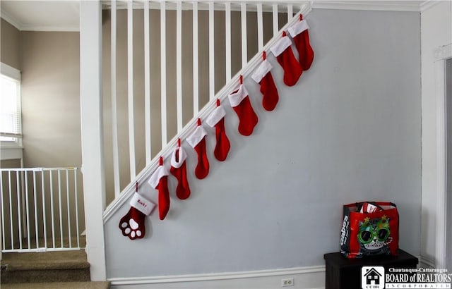 staircase with ornamental molding