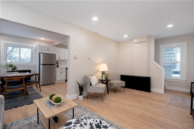 living room featuring light wood-type flooring