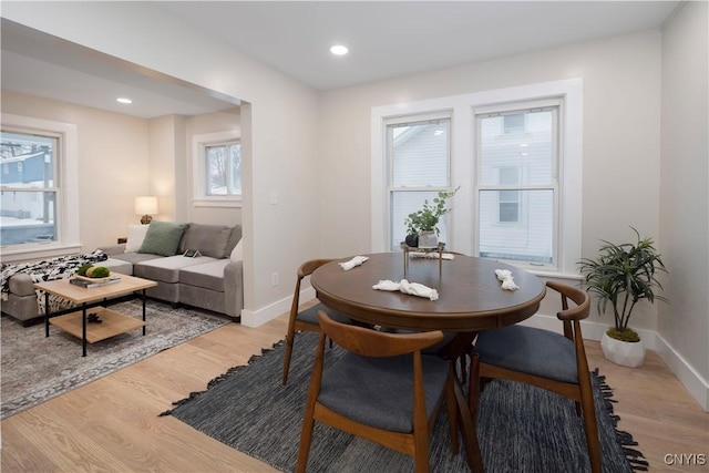 dining room with light wood-type flooring