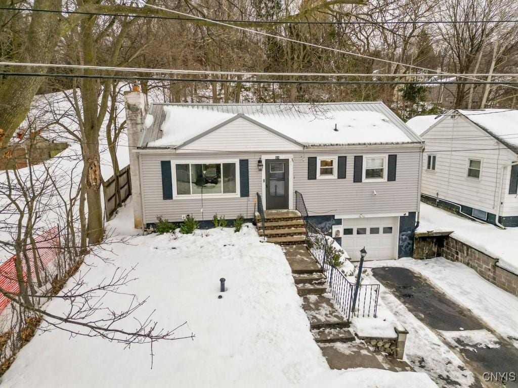 view of front of property with a garage