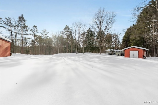 view of yard layered in snow