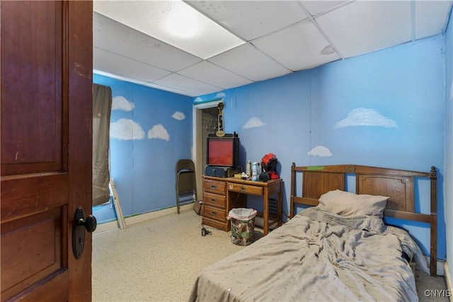 bedroom featuring a drop ceiling