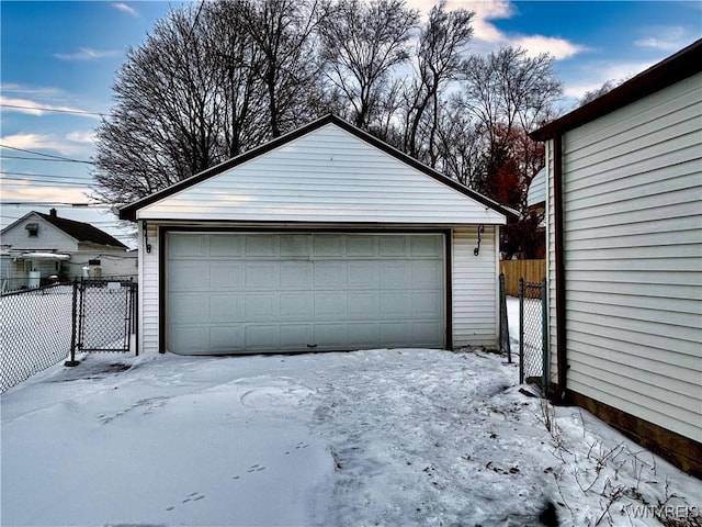 view of snow covered garage