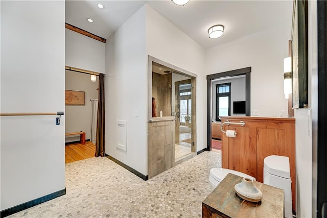 full bath with vanity, baseboards, recessed lighting, a shower stall, and toilet