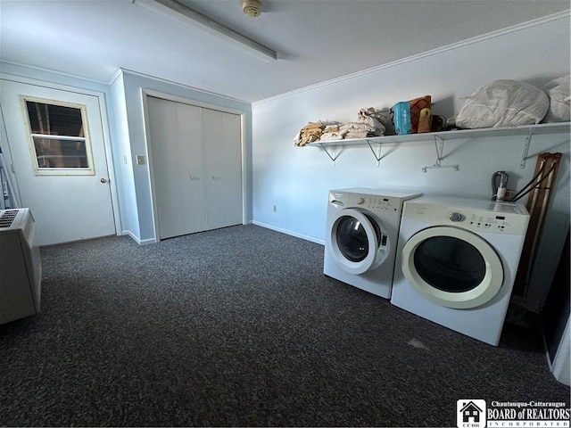 clothes washing area featuring washing machine and dryer and dark colored carpet