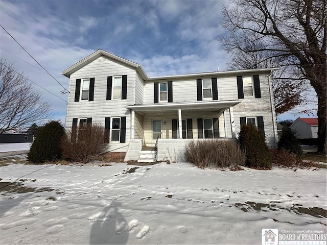 front of property featuring covered porch