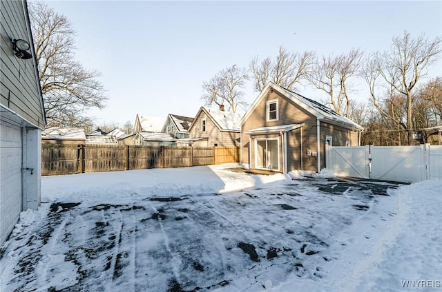 view of yard layered in snow