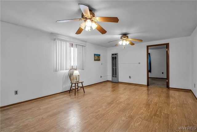 spare room with light wood-type flooring