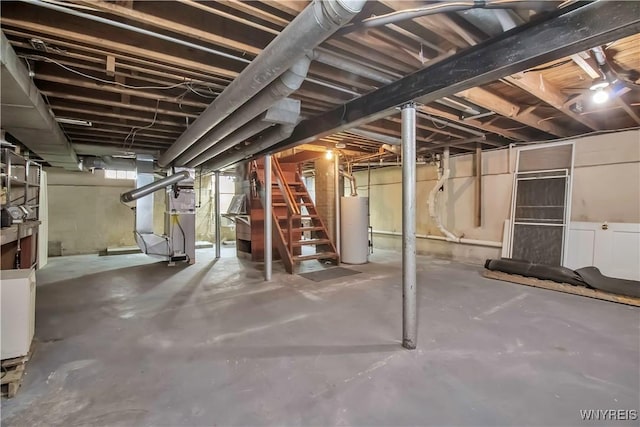 basement with water heater and heating unit