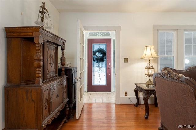 entrance foyer with light wood-type flooring