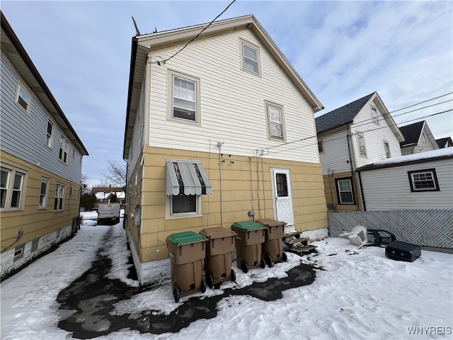 view of snow covered house