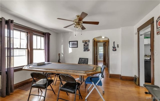 dining space featuring ceiling fan and light hardwood / wood-style flooring