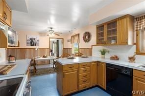 kitchen featuring ceiling fan, kitchen peninsula, dishwasher, and range