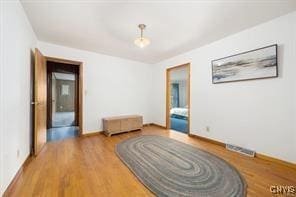 empty room featuring hardwood / wood-style flooring