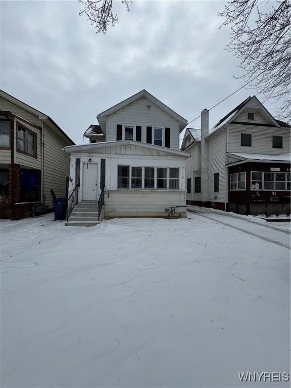 view of snow covered property