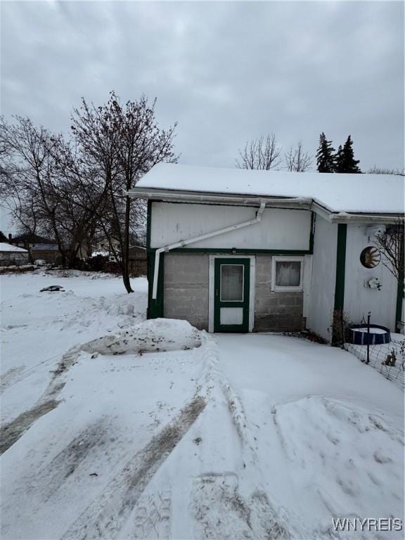 view of snow covered garage