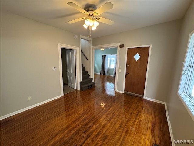 entryway with ceiling fan and dark hardwood / wood-style floors