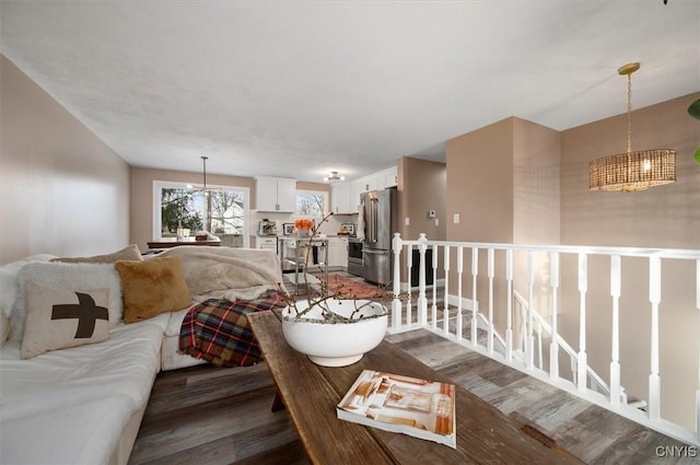 living room with dark hardwood / wood-style floors