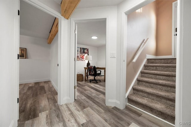 corridor featuring wood-type flooring