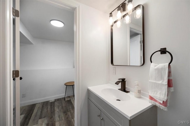 bathroom featuring vanity and wood-type flooring