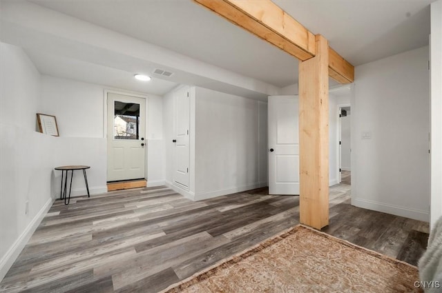 interior space featuring hardwood / wood-style floors and a closet