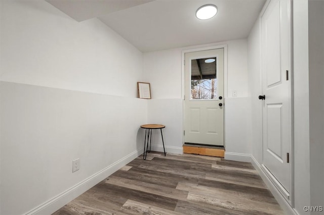 entryway with dark wood-type flooring