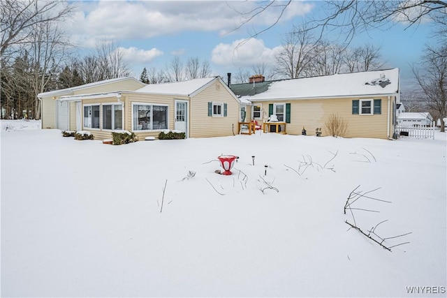 view of snow covered property