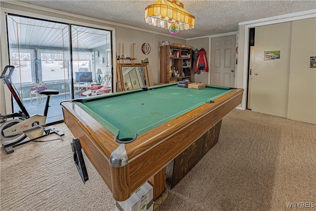 rec room featuring crown molding, carpet, a textured ceiling, and billiards