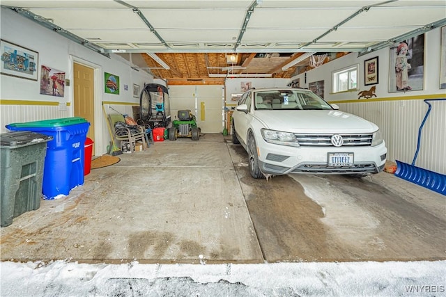 garage featuring a garage door opener