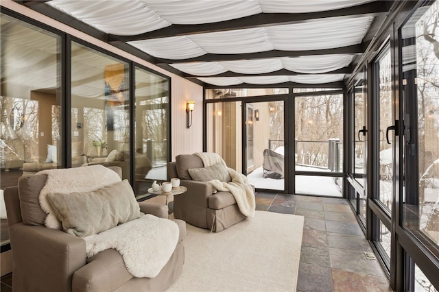 sunroom / solarium featuring a wealth of natural light