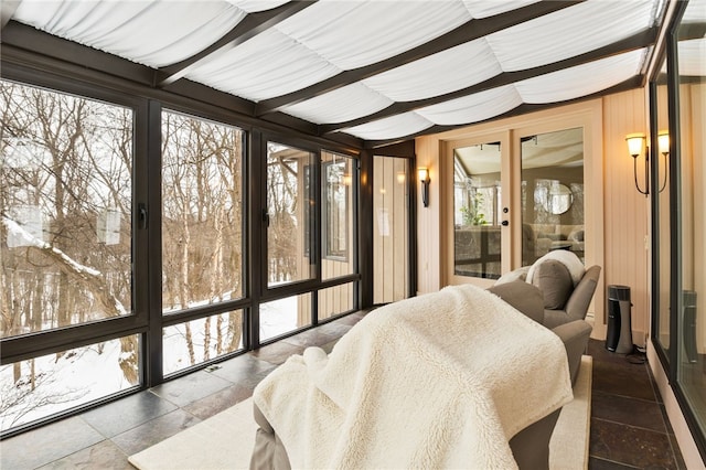 sunroom with french doors and beam ceiling