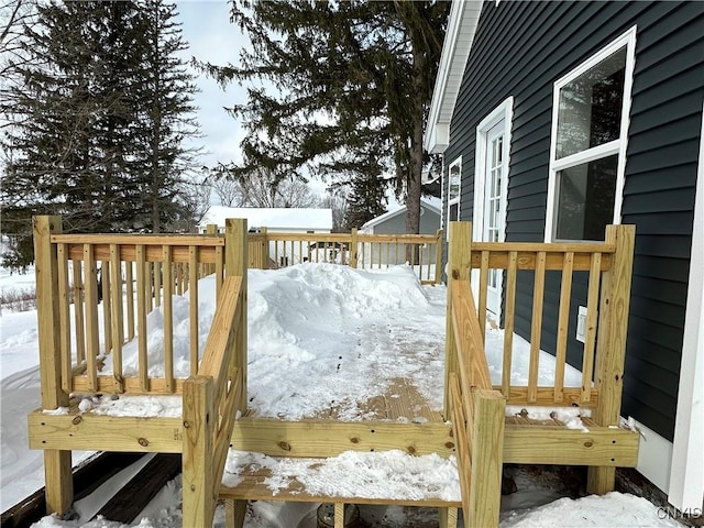 view of snow covered deck