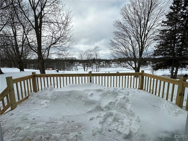 view of snow covered deck