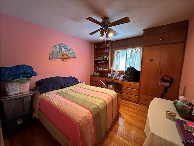 bedroom featuring ceiling fan and light hardwood / wood-style floors