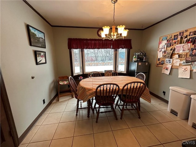 tiled dining space with an inviting chandelier and crown molding