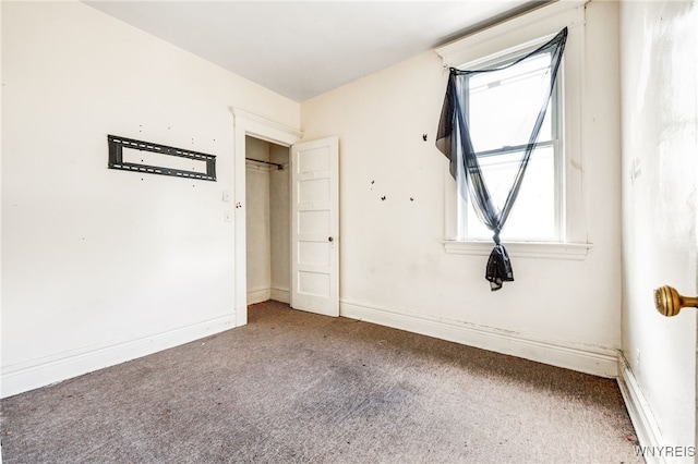 unfurnished bedroom featuring carpet floors